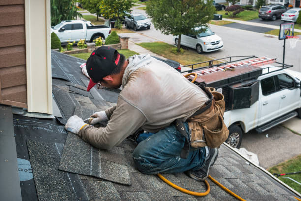 Professional Roofing technician working in Oak Hall, VA